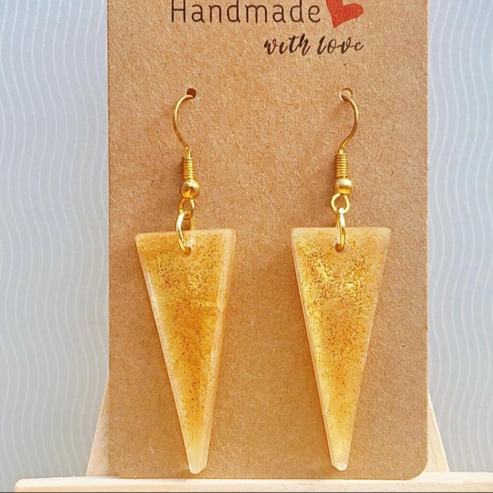 Gold triangle earrings – photo 2